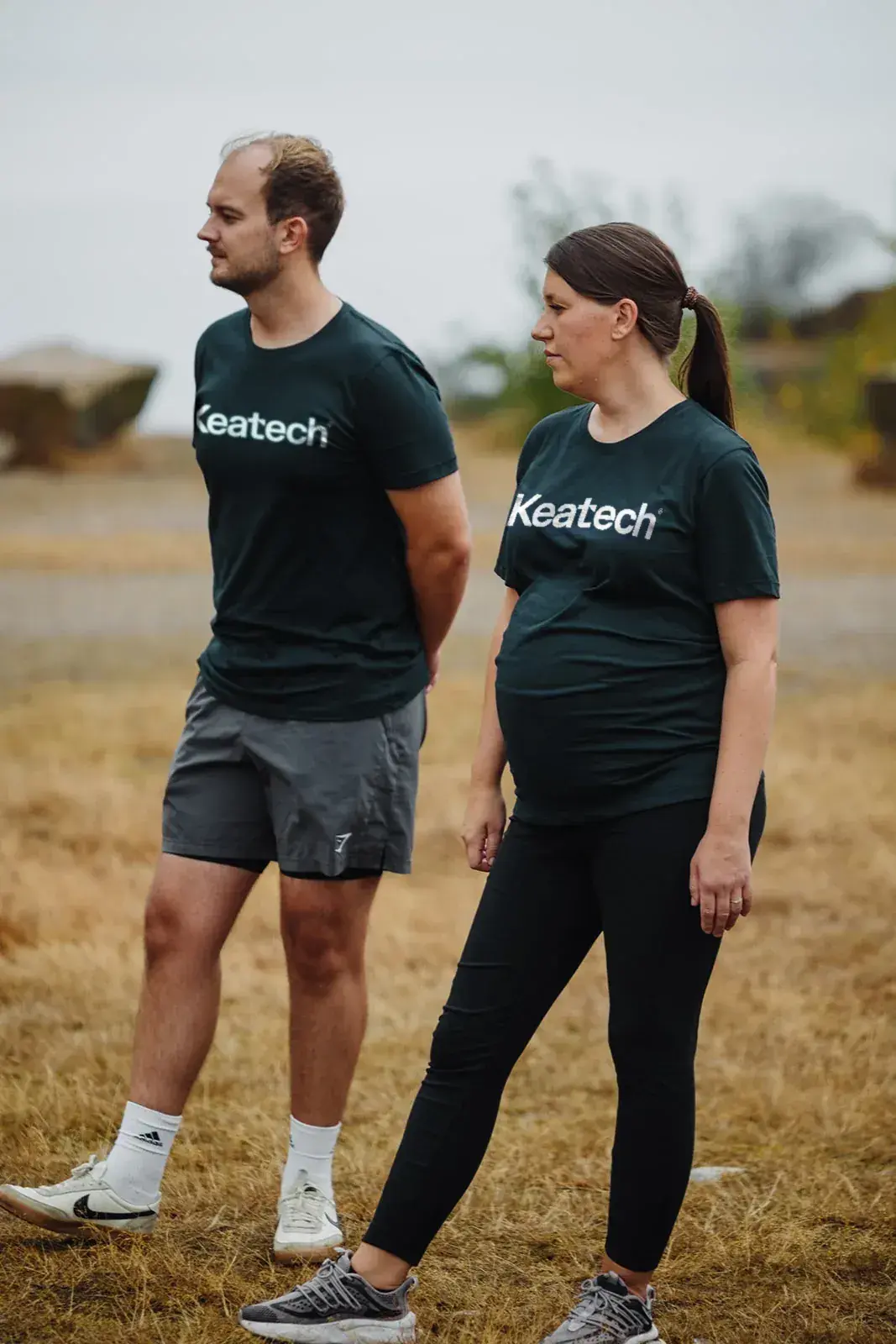 Keatech team members walking in branded shirts