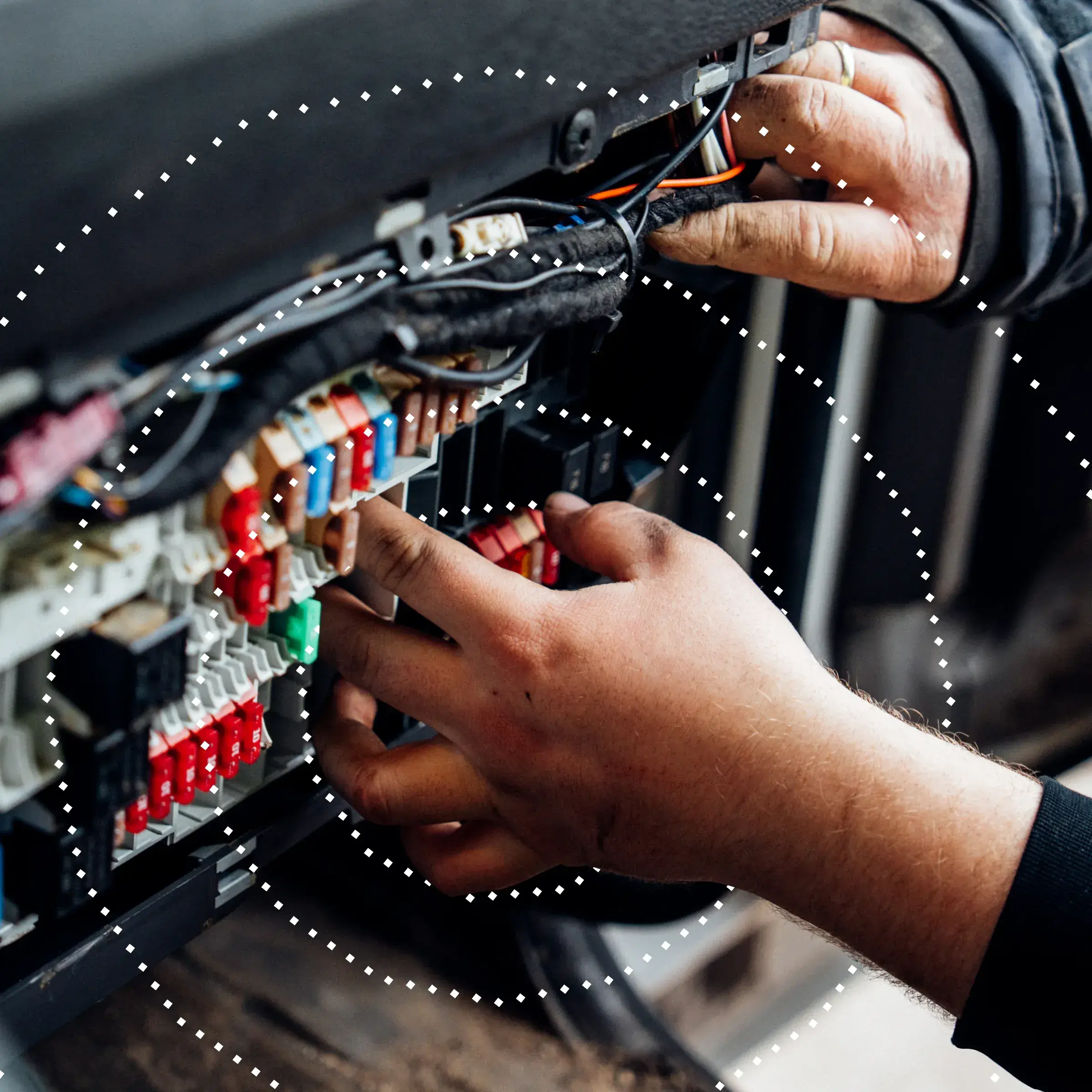 Professional technician installing fleet tracking device